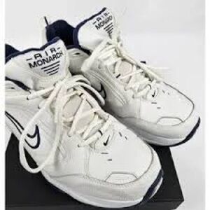 Nike Air Monarch IV White and Navy Sneakers Men’s size 11.5 good condition.
